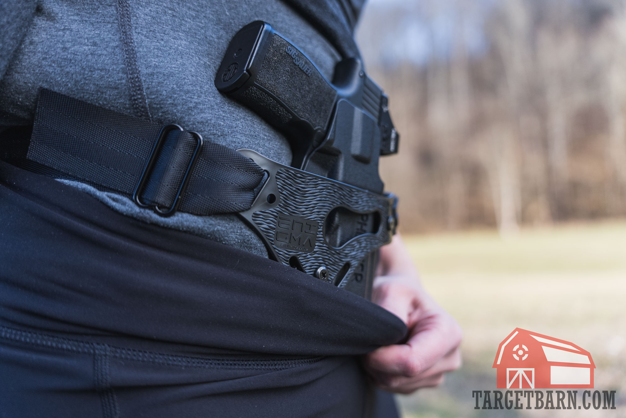 the phlster enigma v2 with a sig p365xl being worn at the range