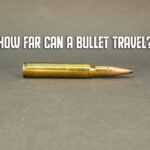 how far can a bullet travel hero image over a bullet on its side